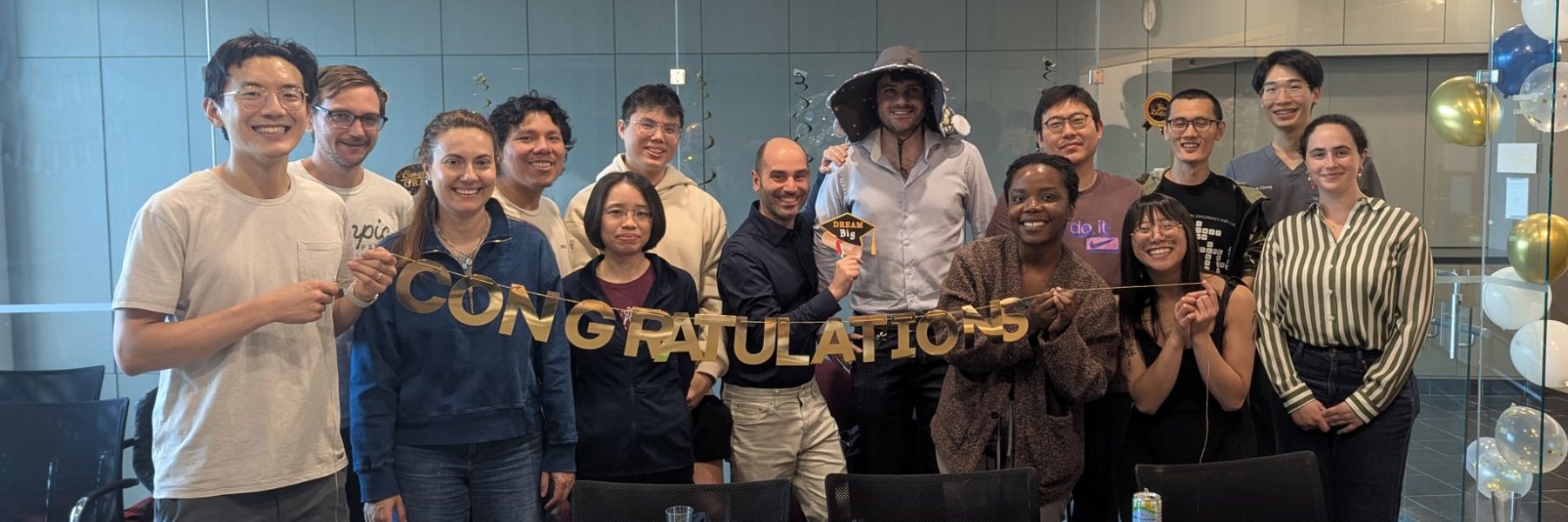 The Moffitt Lab team celebrating together